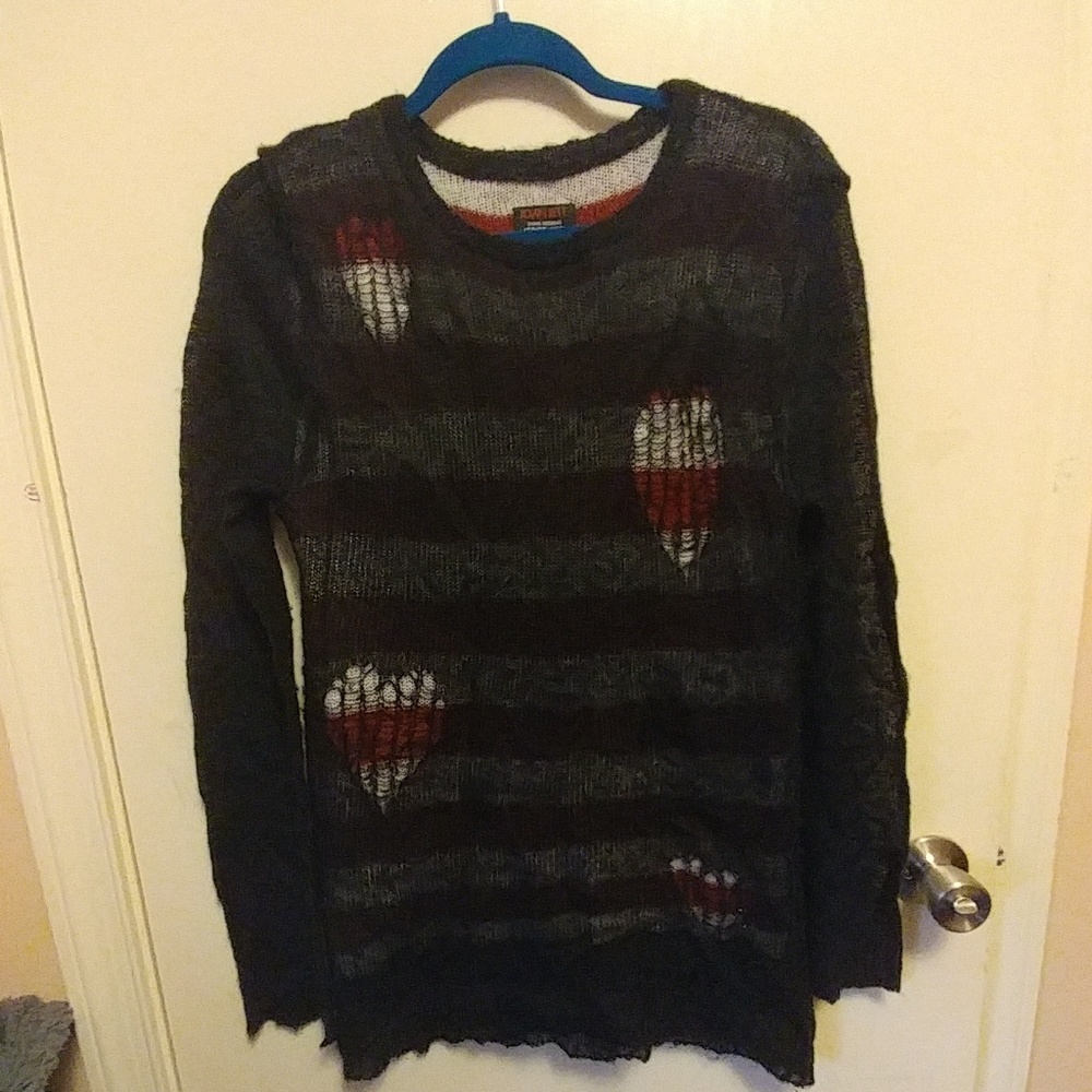 Joan Jett X Tripp sweater.